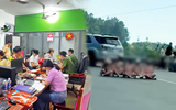Nhóm phụ nữ ngồi giữa khúc cua đèo Hải Vân chụp ảnh: Mỗi người bị xử phạt 250.000 đồng