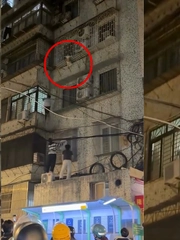 Thanh niên leo 4 tầng để giải cứu bé trai mắc kẹt 'chuồng cọp'