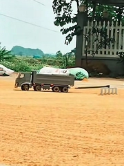 Chiếc xe cào lúa 'cây nhà lá vườn' của con trai khiến bố mẹ mát lòng mát dạ