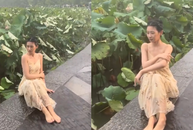 Mặc kệ mưa to gió lớn, cô gái vẫn bình thản tạo dáng thật 'slay'