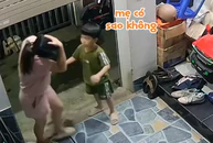 Mẹ đụng đầu vào cửa cuốn, phản ứng của con trai gây bão mạng