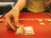 Giá vàng thế giới giằng co quanh ngưỡng 3.300 USD/ounce