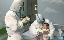 Gia đình nhiễm virus corona, các y tá thay nhau làm 'mẹ' em bé