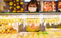Giá vàng tăng lại nhưng lo lãi suất của FED