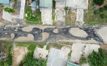 Khổ vì mặt quốc lộ như bị 'dội bom'
