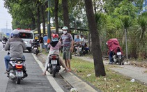 Một người đàn ông được phát hiện gục chết trên xe máy trên đường Phạm Văn Đồng