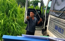 Xin vượt không được, tài xế xe tải cầm thanh sắt chặn đường, đấm chảy máu mũi người khác
