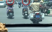 Hai nữ 'ninja' bật đèn xi nhan khiến CSGT bối rối