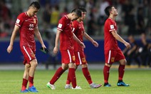 Thiên hạ cứ lo đá World Cup, Trung Quốc lo kiếm tiền