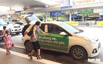 Taxi và Grab tranh cãi về quy định gắn mào trên nóc