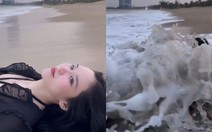 Cô gái uống ngập nước khi đu trend quay sóng biển