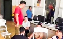 Công an khống chế nhóm người khi tới một văn phòng công chứng tại Bình Dương