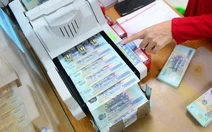 Tiền tiết kiệm được gửi vào ngân hàng vượt 15 triệu tỉ đồng
