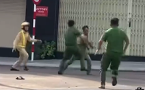 Đem xe máy giấu ở nghĩa trang sau tai nạn, tấn công cảnh sát giao thông