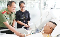 Tặng bằng khen cho đại úy cảnh sát bị tông chấn thương khi đang bảo vệ buổi tổng hợp luyện A80