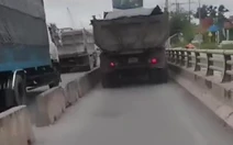 Xác minh clip xe ben chạy trong làn xe máy trên cầu vượt Tân Vạn