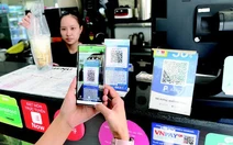 Gen Alpha sớm biết tiết kiệm, quen với việc chạm để thanh toán