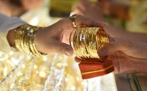 Giá vàng và bạc giảm mạnh do áp lực chốt lời