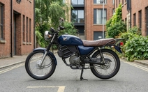 Honda làm xe máy điện giá rẻ, pin có thể tháo rời đặt trong 'bình xăng'