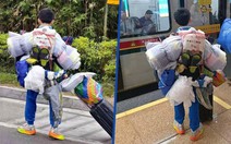 Cậu bé 14 tuổi vác 'núi' hành lý về quê ăn Tết khiến dân mạng thán phục