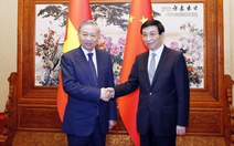 Tổng Bí thư, Chủ tịch nước Tô Lâm gặp Chủ tịch Chính hiệp toàn quốc Trung Quốc