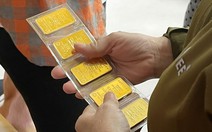 Giá vàng giảm mạnh vì nỗi lo Fed tăng lãi suất