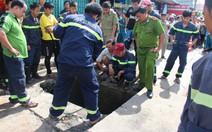 Tìm em bé nghi bị nước mưa cuốn xuống ống cống