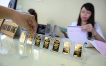 Vàng giảm 550.000 đồng, USD ngân hàng vẫn kịch trần