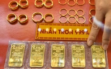 Giá vàng, bạc hạ nhiệt do áp lực chốt lời