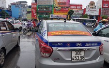 Bộ Giao thông đề nghị dán logo nhận diện xe Uber, Grab