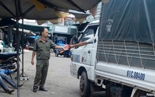 Đình chỉ đội trưởng dân phòng thu tiền xe tại khu vực cấm đỗ