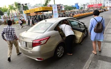 Siết chặt Uber, Grab…