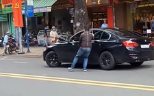Vụ nữ tài xế BMW lao xe vô thanh niên đập xe hơi: Mâu thuẫn do va chạm giao thông