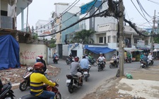 Các hộ dân tháo dỡ nhà, mở rộng nút cổ chai đường Bùi Đình Túy