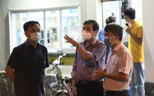 Khoanh vùng một tòa nhà ở quận Phú Nhuận và một phần Bệnh viện Nhân dân Gia Định