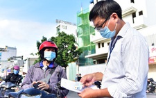 HỎI - ĐÁP về COVID-19: Phải chứng minh trong danh sách điểm bán hàng thiết yếu mới được đi bán hàng?