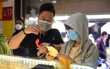Giá vàng bật tăng sau khi Fed giảm tốc độ tăng lãi suất