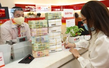 Tín dụng ‘chảy’ nhiều nhất vào kinh doanh, đầu tư chứng khoán, bất động sản