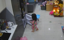 Con gái mang điện thoại của mẹ cất vào tủ lạnh