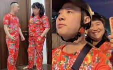 Vợ cười khoái chí khi sắm được bộ đôi quần áo hoa đi chơi Tết