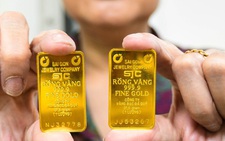Giá vàng thế giới lao dốc, trong nước bất động