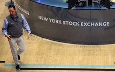 Wall Street gains on Amazon boost but rate caution tempers enthusiasm