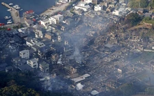 Fire razes 170 buildings in southern Japan, one missing