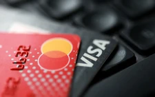 Visa, Mastercard to pay $167.5 million in ATM user fee settlement
