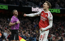 Arsenal ignore injury woes to retain top spot with win over Brighton
