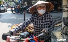 Breathing dust: Hanoi’s street workers face health risks amid smog