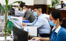 Đề xuất bảo lưu tiền lương trong sáu tháng cho cán bộ sau sáp nhập