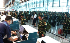 Lao troops arrive in Vietnam for Reunification Day parade