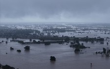 Death toll in Australia floods rises to four, tens of thousands stranded