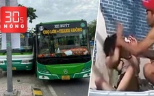 Bản tin 30s Nóng: Xe buýt ép nhau văng lên lề ở TP.HCM; Livestream cảnh tát phụ nữ ôm con